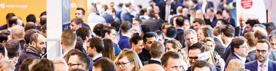 Image of people at E-World - Europe's largest trade fair representing Lacima's dedication to global energy and commodities valuation, optimisation and risk management