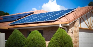 Image of solar panels on residential home roof, reflecting Lacima's renewable energy generation valuation and risk analytics solutions for the retail energy industry such as Lacima Client Canadian Solar